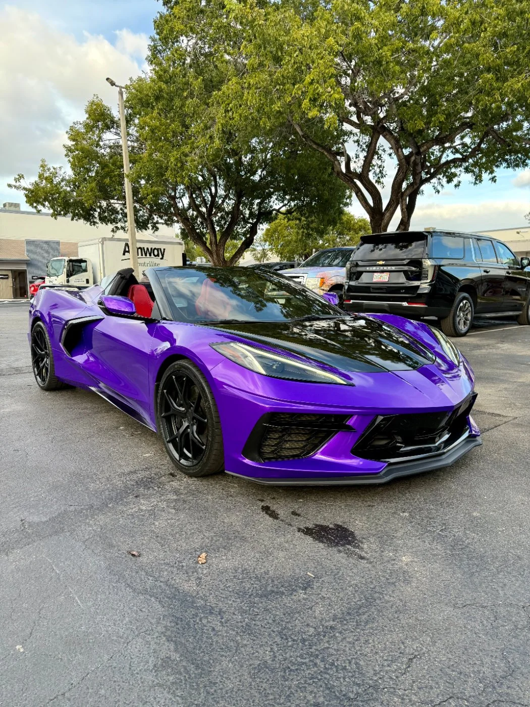 Corvette C8 Midnight purple on Red convertible